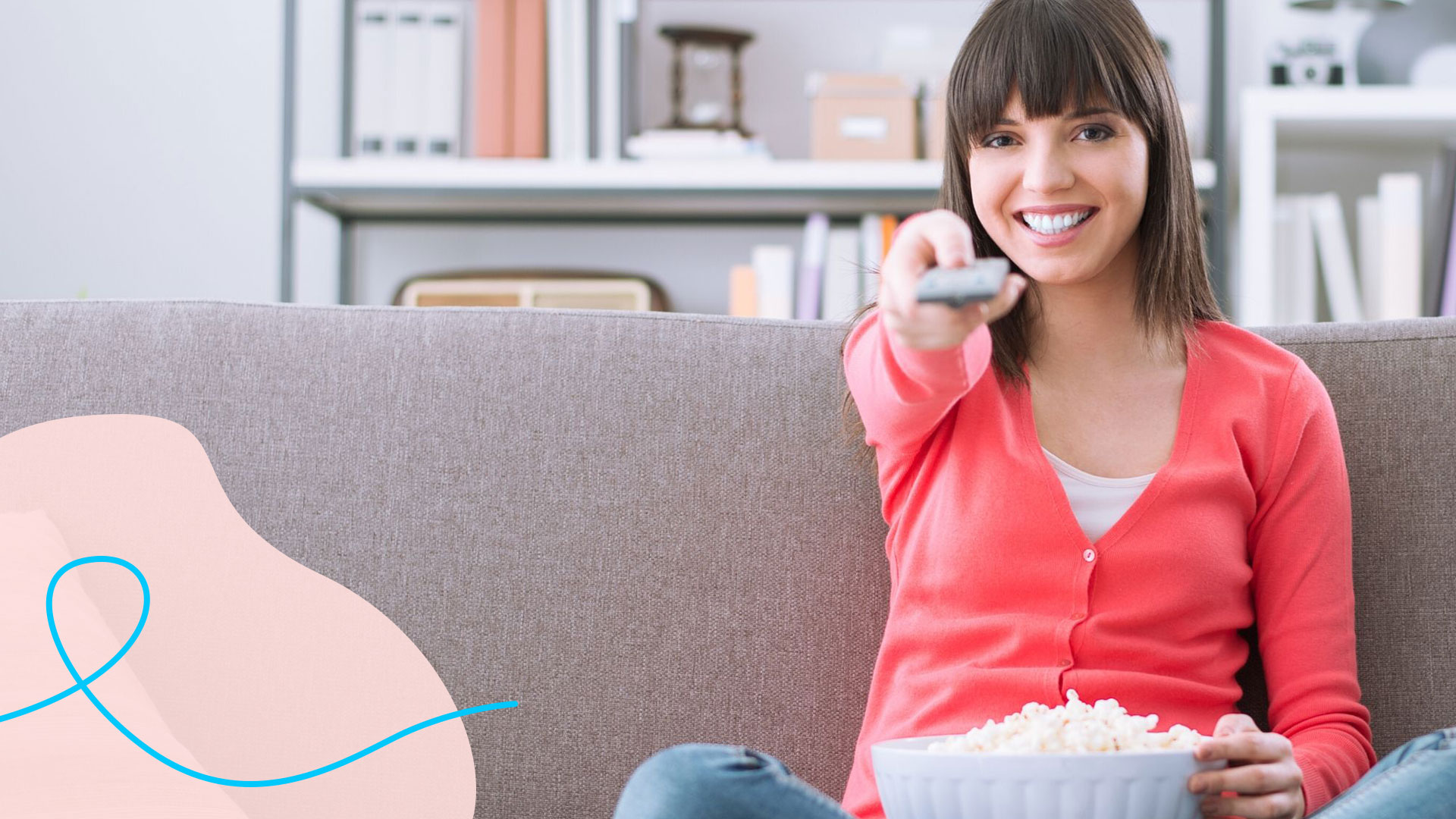 girl watching movies with popcorn